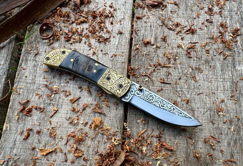 Folding Pocket Knife J2 steel Ram Horn with Hand Engraved Brass Bolster and Hand Engraved Blade USFOL07