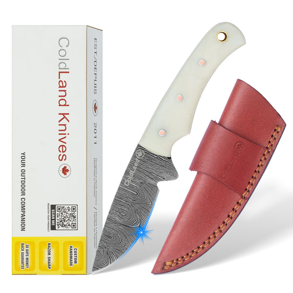 ColdLand Knives knife with white handle and red sheath next to its packaging on a white background