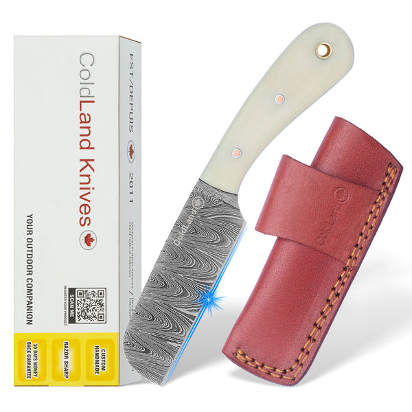 Cowboy Knife Bull Cutter Knife with a leather sheath and Cold Land Knives packaging on a white background